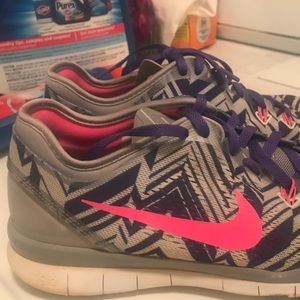 Pink and Purple Nike shoes